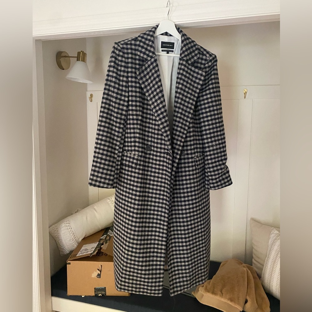 Something navy trench- worn once!